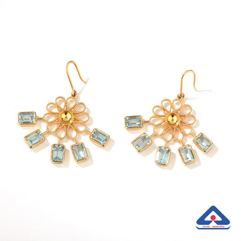 Floral 22 karat gold earring with blue topaz