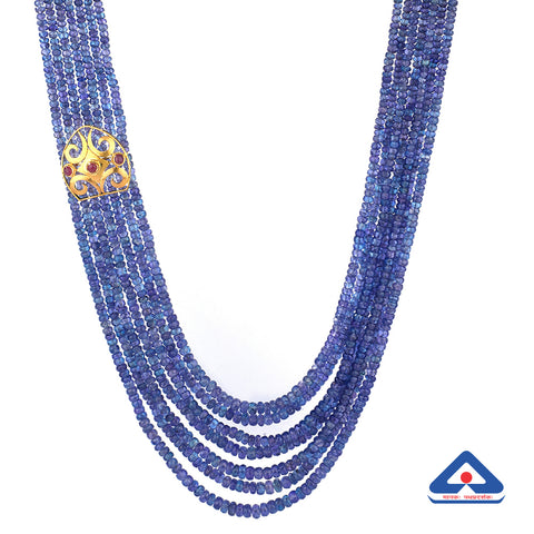 Tanzanite multi-layered 22 karat gold necklace with gold carved motif
